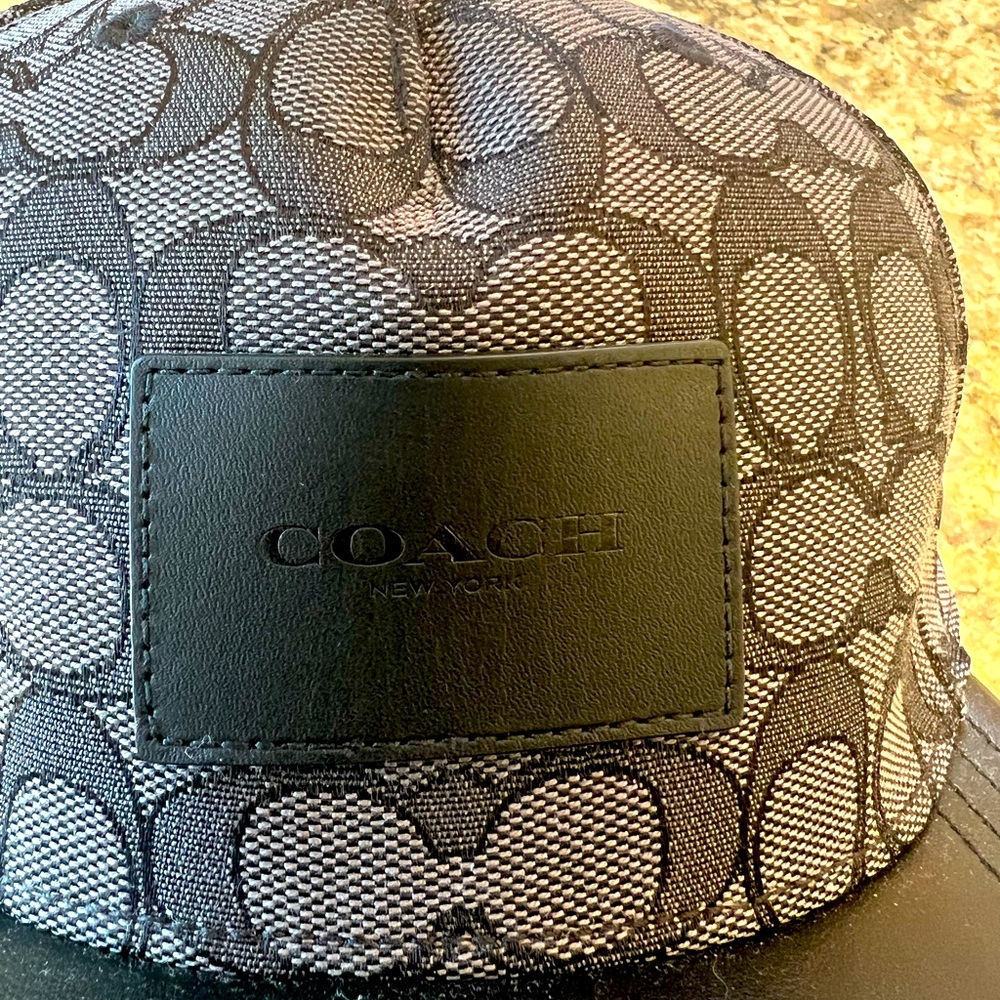 Men’s hat and match belt in coach monogram pattern